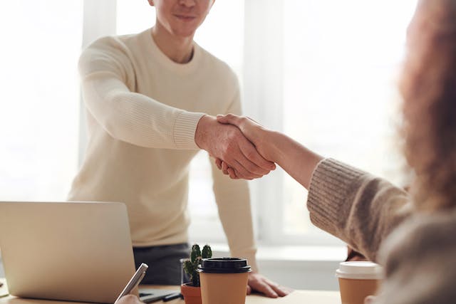 landlord-shaking-hands-with-tenant